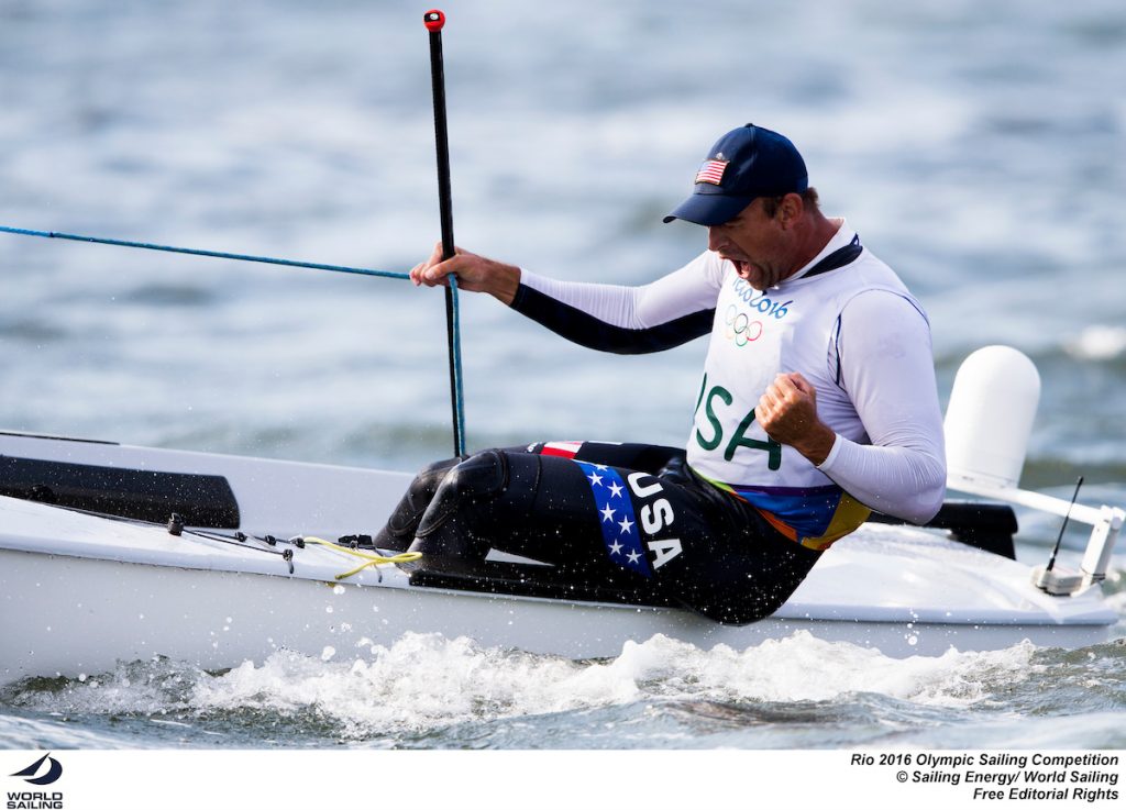 La gioia sfrenata dell'americano Caleb Paine dopo la conquista del bronzo, arrivata grazie alla vittoria nella Medal race finale. Foto Sailing Energy